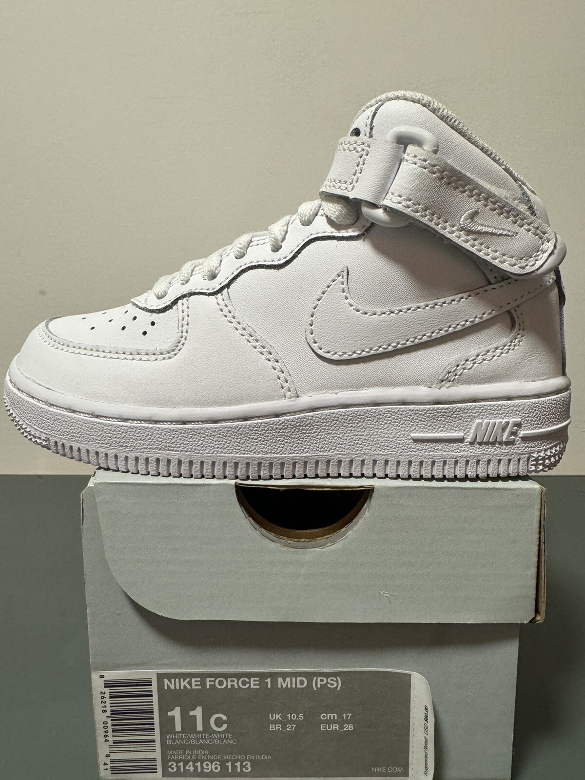 white nike uptowns