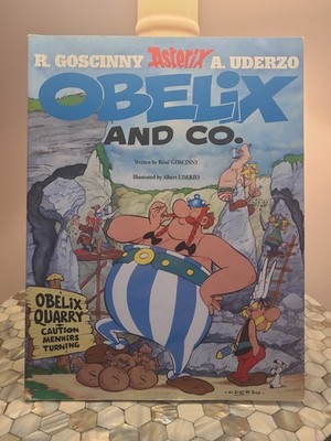 Asterix Obelix and Co.: Album #23 (Asterix (Orion Paperback)) - Paperback - GOOD