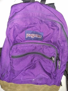 purple jansport backpack leather bottom