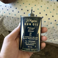 VINTAGE ADVERTISING J C HIGGINS GUN  OILER  LEAD TOP  TIN  GARAGE SHOP  D-509