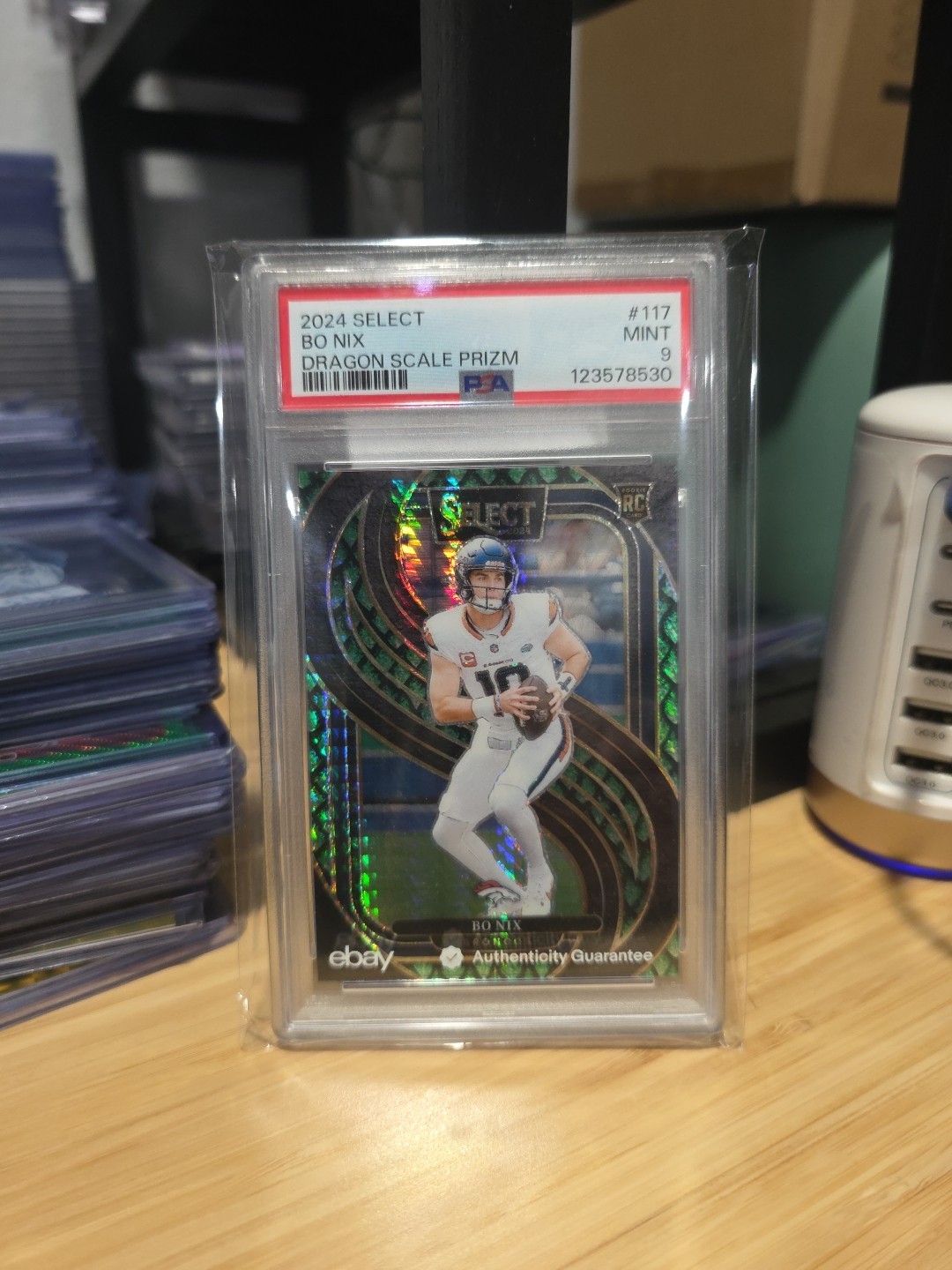 2024 Panini Select - Premier Level Bo Nix #117 Dragon Scale Prizm /81 (RC)