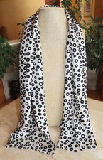 Unbranded oblong scarf; black white dots; 43 x 10.in. likely silk