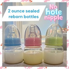 2 ounce sealed baby bottle with no hole nipple for Reborns.