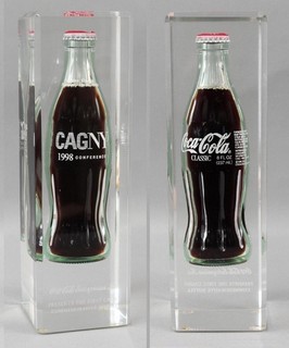 Rare 1998 Full Coca Cola Glass Bottle in Lucite CAGNY Presentation Display NR