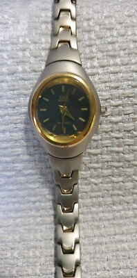 Q&Q Ladies Quartz Watch With Two-toned Metal Band Oval Face And Goldtone Bezel