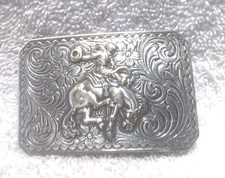 Cowboy Riding Bucking Bronco Buckle Silver Engraved Background great VIntage