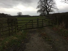 Photo A3 Gated farm track near Bogs Plantation Welburn/SE6884  c2022
