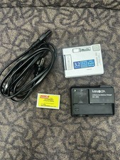 Minolta Dimage X camera and Battery Charger w...