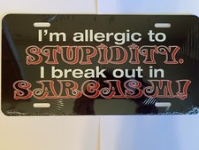 Made in the USA! I’m Allergic To Stupidity I Break Out In Sarcasm license plate.