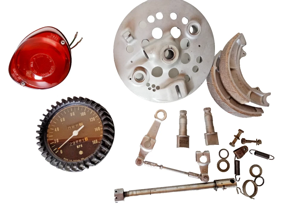 Lote de piezas Suzuki TS250 1971 placa de freno de tambor delantero luz trasera luz de freno Foto 2 de 4