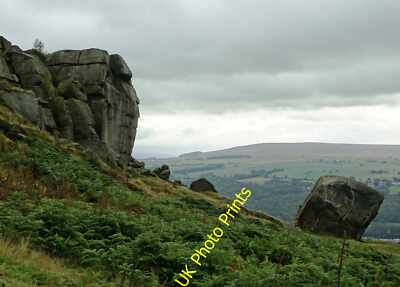 Photo 6x4 The Cow and Calf Rocks under a leaden sky Ilkley  c2015
