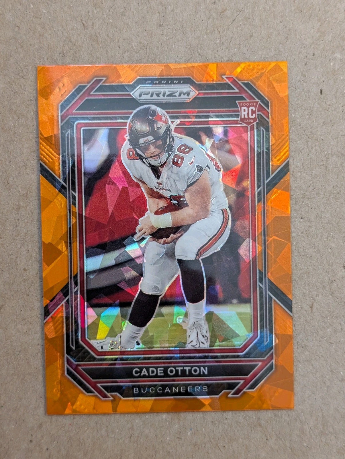 2022 Panini Prizm - Rookies Cade Otton #362 Orange Ice Prizm (RC)