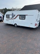 Swift Corniche 18/4 4 birth caravan 2017 complete with side air awning.