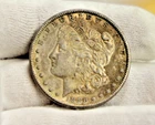 1886 S US Morgan Silver Dollar $1 AU (Cleaned, Retoned)