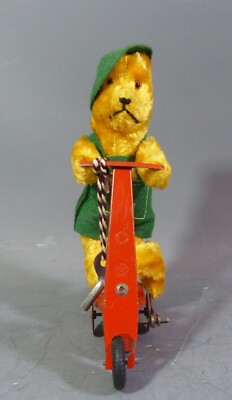 SCHUCCO - SFA - JOUSTRA - OURS SUR PATINETTE