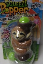 Squeeze Popper Racoon in Tree. Shoots 20 feet. Soft Foam Shooter 54