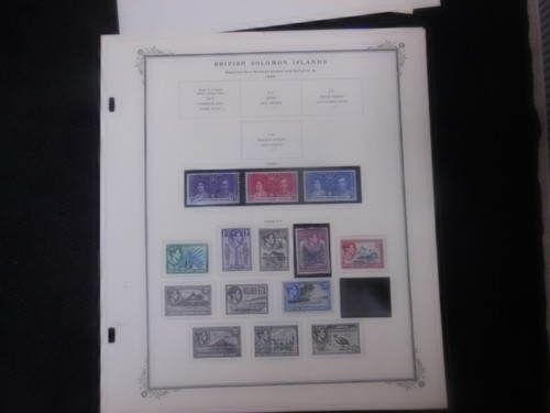 14 francobolli usati, MH Isole Salomone Britanniche su 5 pagine album Scott - Foto 3 di 5