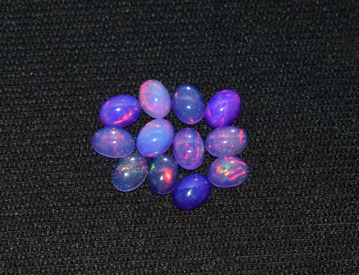 A 12Pcs Natural Ethiopian Purple Opal Fire Opal Loose Gemstone