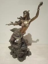 Resin & Bronze cold cast statue of enchanting Mermaid floating above rock
