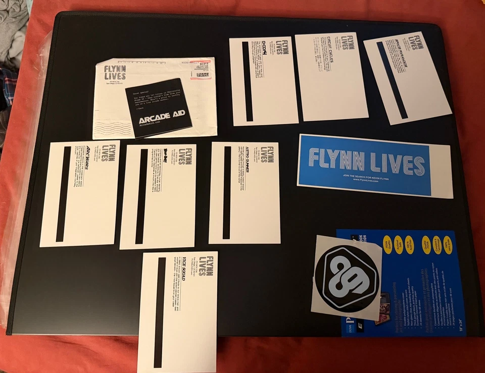 ARCADE AID Disney Tron Legacy ARG Flynn Lives 2010 postales boleto pegatina Ares Foto 2 de 4