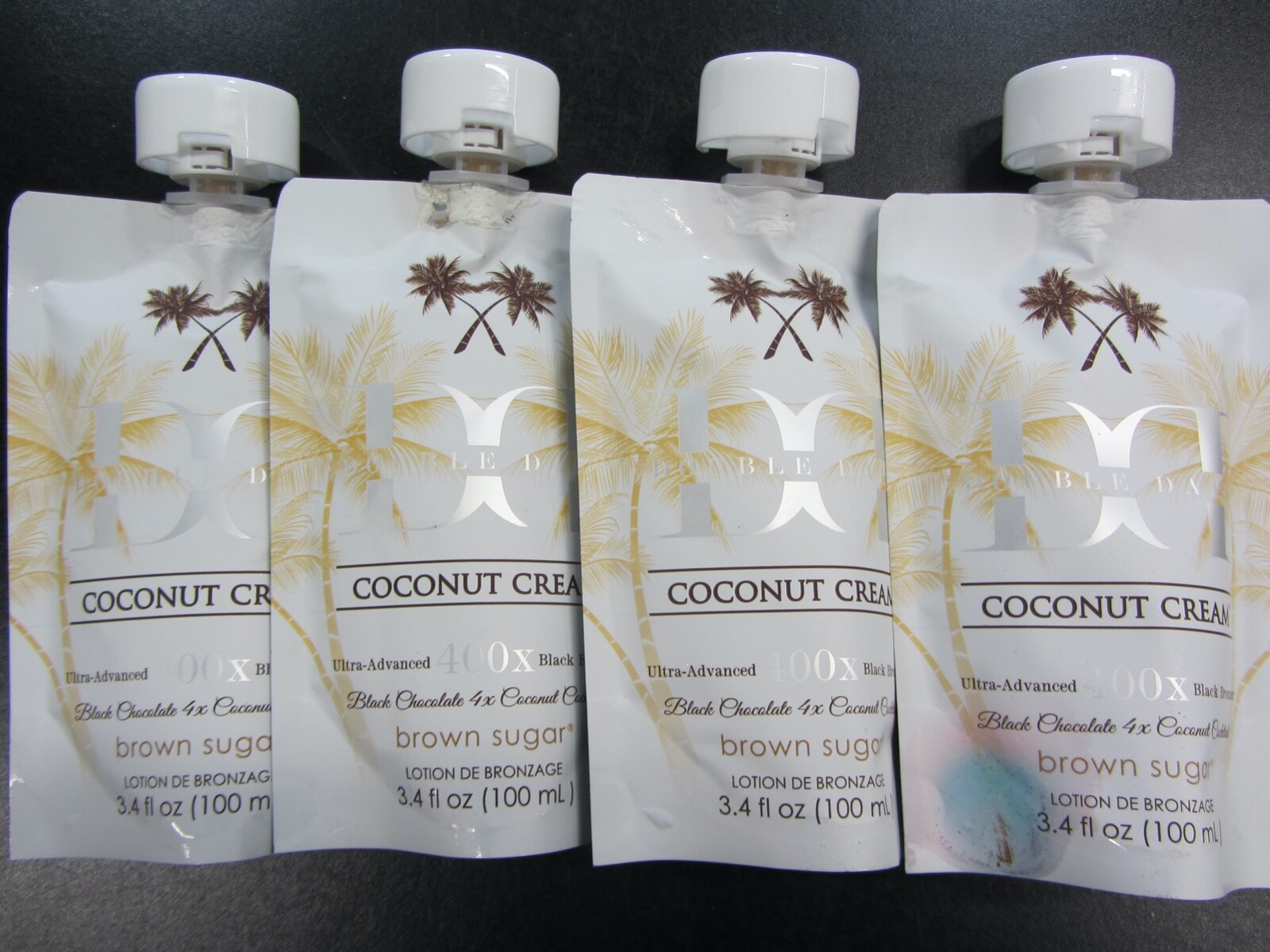 4 POUCHES DOUBLE DARK COCONUT CREAM  BLACK 400X BRONZER 3.4 