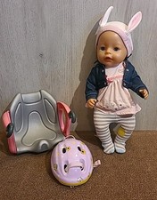 Baby Born Puppe von Zapf mit Fahrrad Sitz und  Helm 