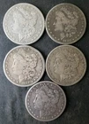 1879, 1880 O, 1881 S, 1883, and 1883 $1 Morgan Silver Dollars