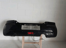 7181162J00799 Paraurti post.  SUZUKI SWIFT 1.3 DDiS (51Kw) Ber. 5p/d/1248cc