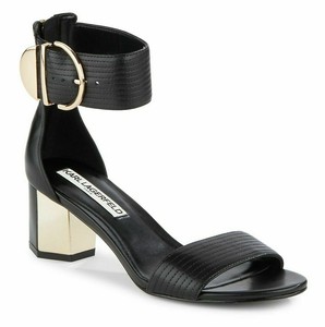 black sandals with gold buckle
