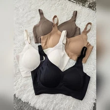 Bundle of 4 women's wireless seamless bras. Size Large. New in package.