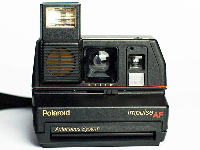 Vintage Polaroid Impulse AF Instant Film Camera in Sleek Black Design