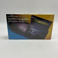 Sharper Image Am/Fm Companion with Smoke Alarm Clock/Radio