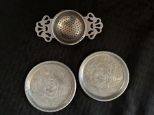 Silver Plated Tea Strainer and 2 Aluminum Coasters