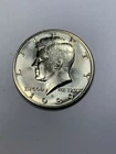 1989-D Almost Uncirculated Kennedy Half Dollar