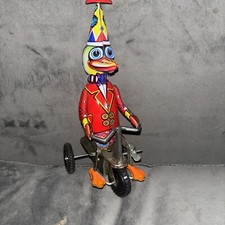 Tin Mechanical Toy Duck Riding on a Tricycle Vintage in Working Condition