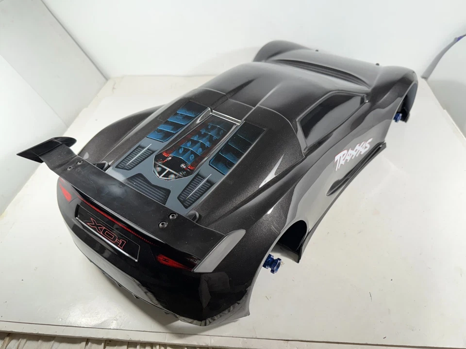 Б/У TRAXXAS XO-1 V1 1/7 ПОЛНЫЙ ПРИВОД ДОРОЖНЫЙ СУПЕРКАР РОЛИКОВЫЙ ПОЛЗУНОК ШАССИ С КОРПУСОМ - Изображение 4 из 4