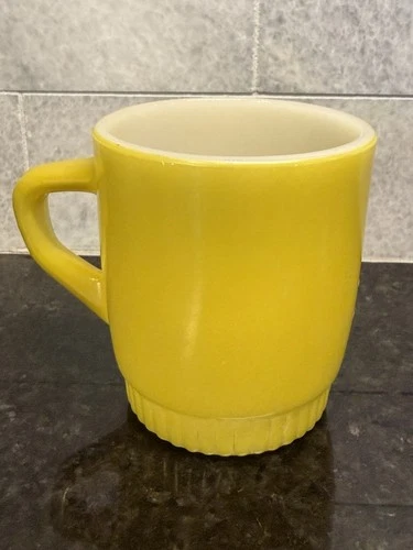 vintage Fire-King D-Handle stacking mug in yellow milk glass