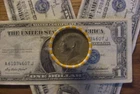 kennedy half dollar roll with a 40% silver 1967 half on end in vV- good cond.