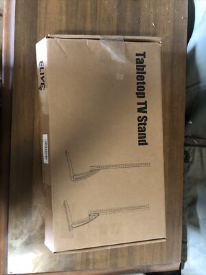 Universal Tabletop TV Stand, Open Box, Complete with Tools and Instructions.