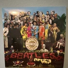 The Beatles - Sgt. Pepper's Lonely Hearts Club Band 12" 33 RPM Vinyl LP Capitol