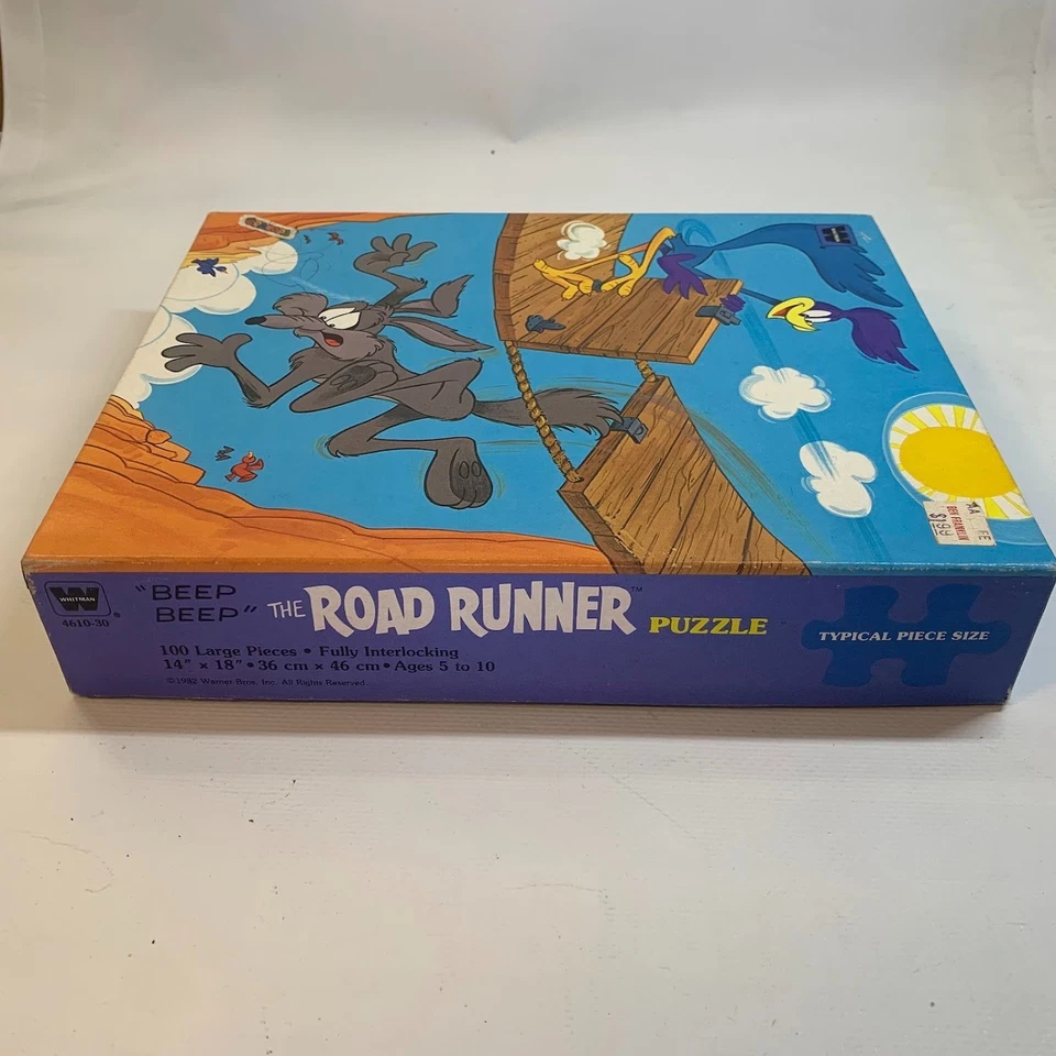 Rompecabezas Road Runner Coyote Looney Tunes 1982 de colección Milton Bradley 100 piezas 14"x18" Foto 3 de 4