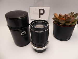 Minolta MC Tele Rokkor-QD 135mm f/3.5 lens with filter and case optics clear MD