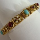VINTAGE UNSIGNED ART MULTIC COLOR RHINESTONE FAUX TURQUOISE FLOWER BRACELET — photo 1
