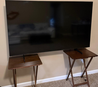 Black Flat Screen TV with Stand Feet - Flat Panel Television
