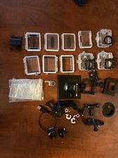 Various GoPro Accessories, Batteries, Cases, And Mounts