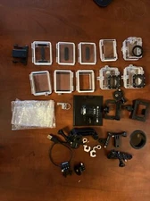 Various GoPro Accessories, Batteries, Cases, And Mounts