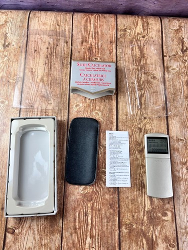 Slide Calculator Calendar Alarm clock currency converter New Open Box - Picture 1 of 8