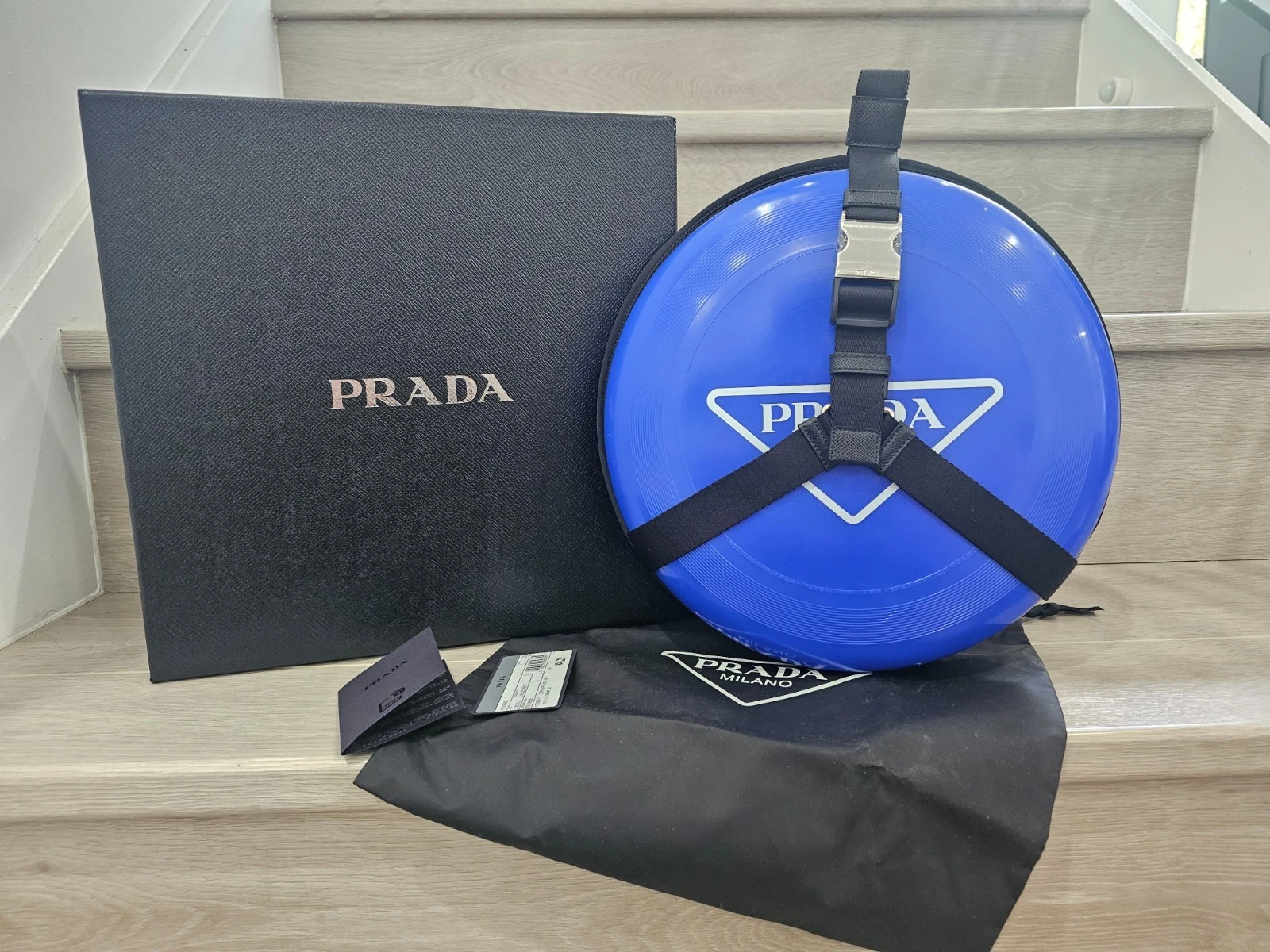 Prada — PRADA 2XD0122DYO blue frisbee w/ logo holder & strap RRP$1210