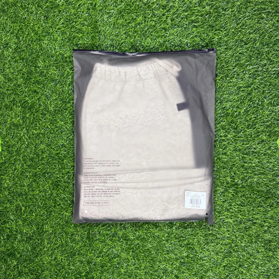 Pantalones Cortos Fear of God Essentials SS22 Gran Tamaño Avena Ligera Niebla (XS-XL) Foto 4 de 4