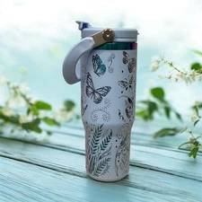 This 30 oz stainless steel tumbler features Sleek, Durable, Light Blue, Laser